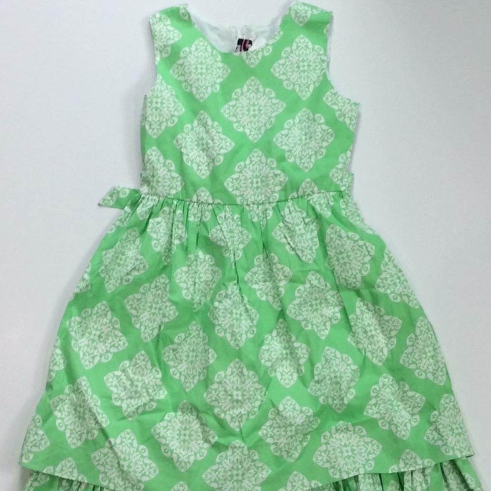 Sleeveless cotton damask ruffled hem dress